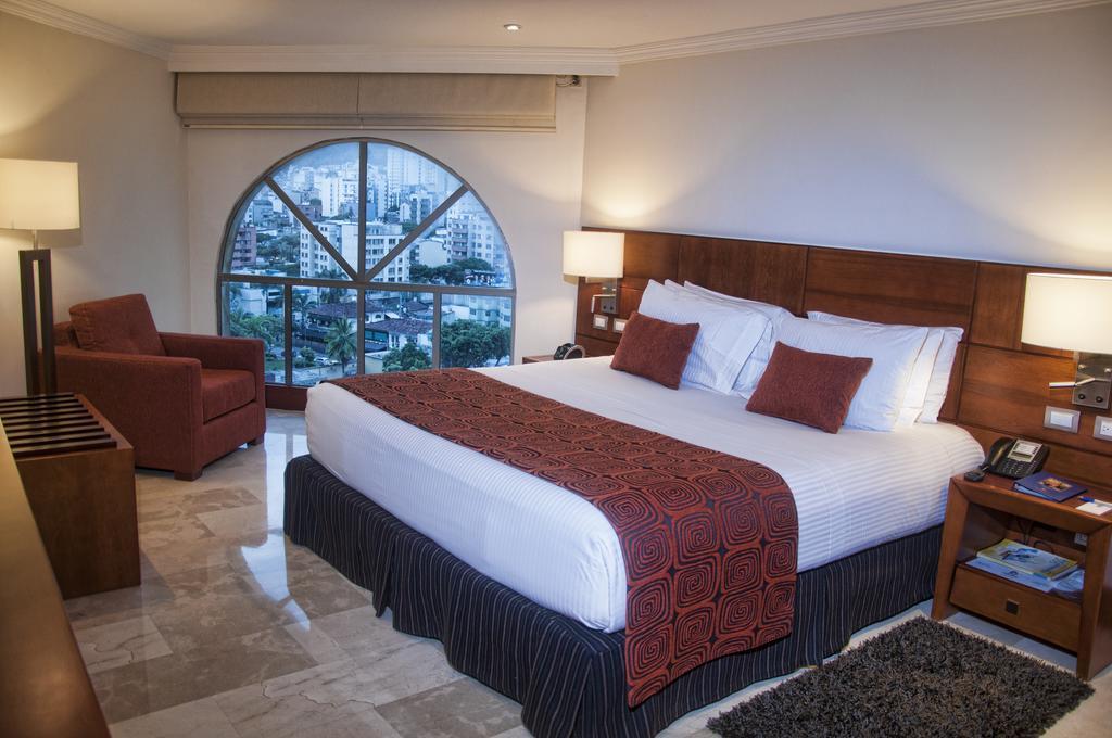 布卡拉曼加丹恩卡尔顿酒店 外观 照片 A bedroom at the hotel